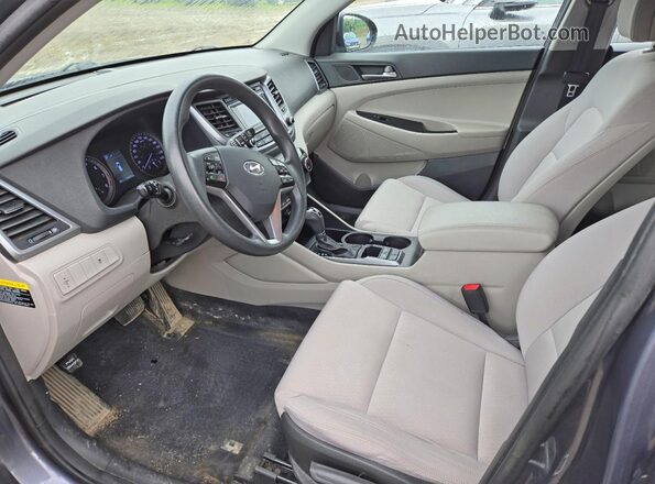 KM8J2CA44HU545006 2017 HYUNDAI TUCSON Серый Вид салона спереди