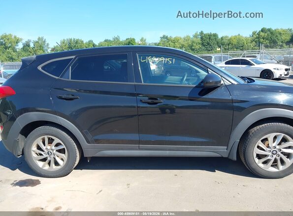 KM8J2CA44JU639201 2018 HYUNDAI TUCSON Black Սալոնի հետևի տեսք