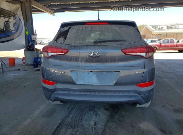 KM8J2CA44JU696417 2018 HYUNDAI TUCSON Gray Вид ззаду