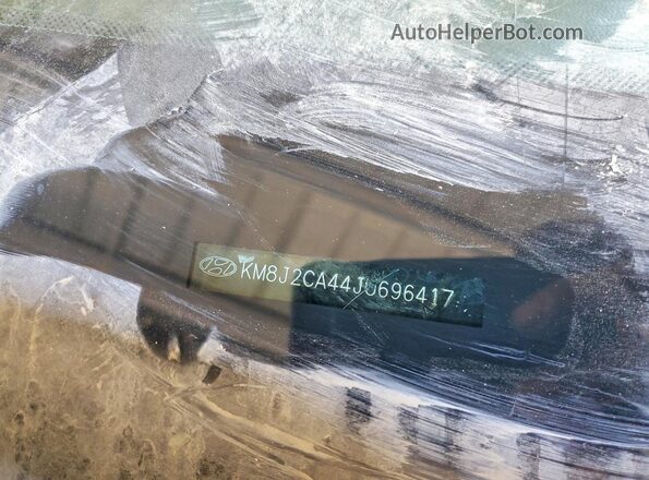 KM8J2CA44JU696417 2018 HYUNDAI TUCSON Gray Вид підкапотного простору