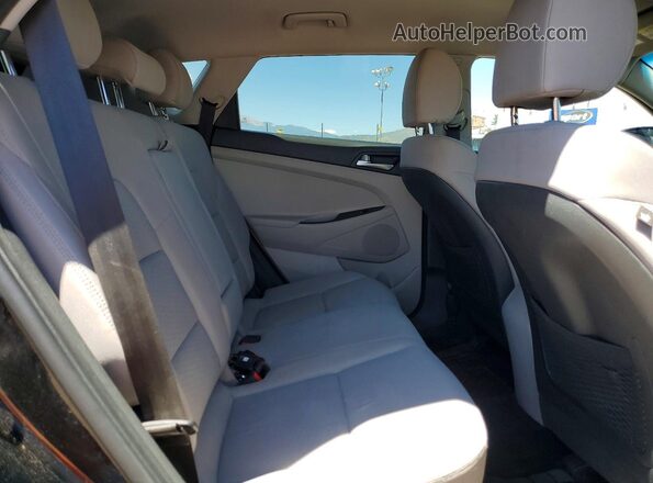 KM8J2CA44LU136822 2020 HYUNDAI TUCSON Black Rear interior view