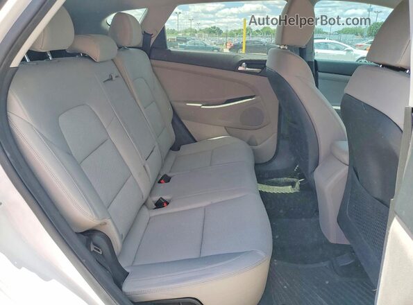 KM8J2CA44LU263618 2020 HYUNDAI TUCSON White Vista de los asientos traseros
