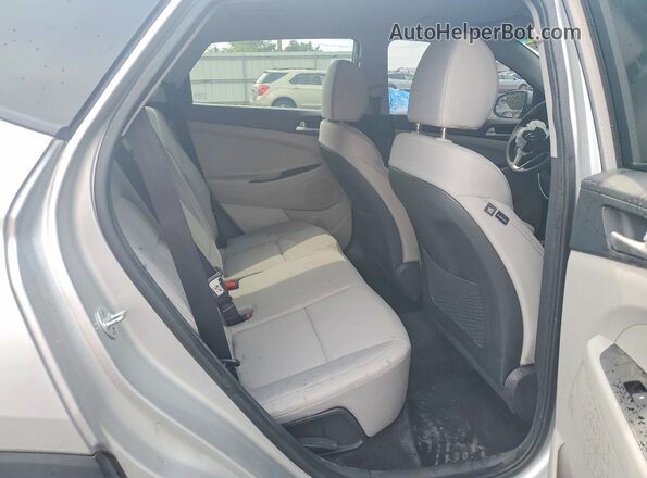 KM8J2CA44MU394629 2021 HYUNDAI TUCSON Silver Vista interior trasera