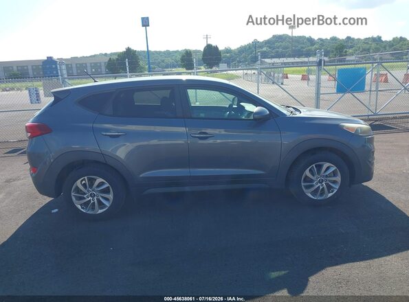 KM8J2CA47JU656459 2018 HYUNDAI TUCSON Gray Widok wnętrza z tyłu
