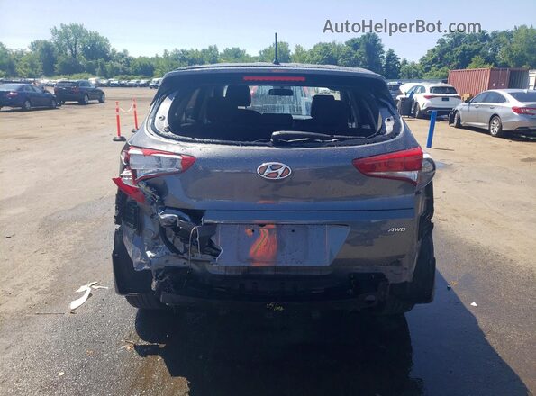 KM8J2CA47JU754746 2018 HYUNDAI TUCSON Gray Հետևի տեսք