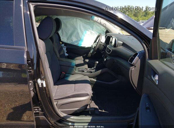 KM8J2CA47MU372656 2021 HYUNDAI TUCSON Black Front interior view