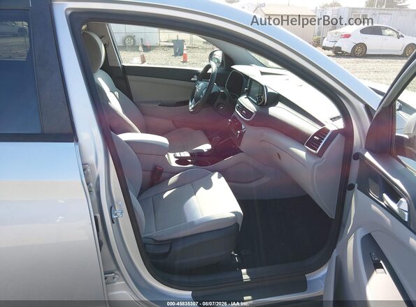 KM8J2CA48KU999623 2019 HYUNDAI TUCSON Silver Вид салону спереду