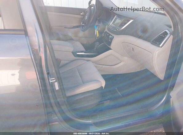 KM8J2CA49JU655345 2018 HYUNDAI TUCSON Gray Սալոնի դիմացի տեսք