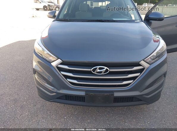 KM8J2CA49JU655345 2018 HYUNDAI TUCSON Gray Դիմացի տեսք