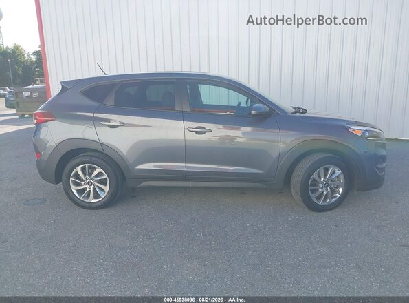 KM8J2CA49JU655345 2018 HYUNDAI TUCSON Gray Սալոնի հետևի տեսք