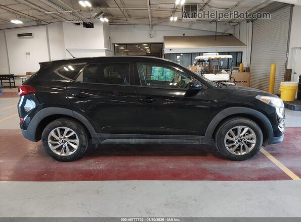 KM8J2CA49JU656141 2018 HYUNDAI TUCSON Black Vista interior trasera