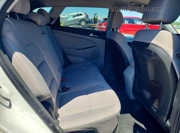KM8J2CA4XKU072722 2019 HYUNDAI TUCSON White უკანა სალონის ხედი