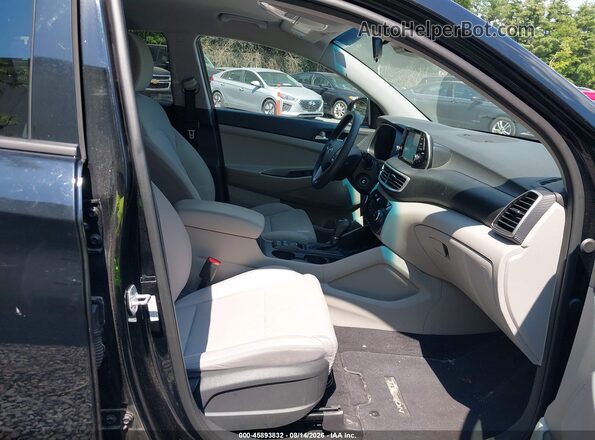 KM8J2CA4XKU999848 2019 HYUNDAI TUCSON Черный Вид салона спереди