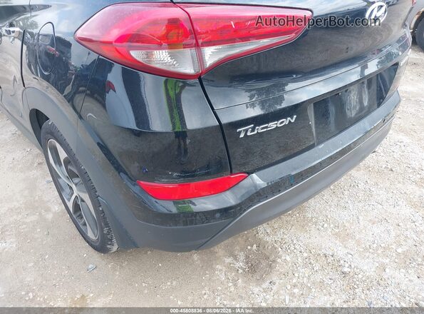 KM8J33A21GU038090 2016 HYUNDAI TUCSON Black Widok z przodu