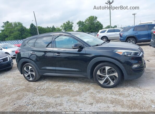 KM8J33A21GU038090 2016 HYUNDAI TUCSON Black Widok wnętrza z tyłu