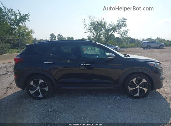 KM8J33A21GU149271 2016 HYUNDAI TUCSON Black Вид задньої частини салону