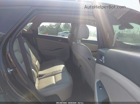 KM8J33A21GU149271 2016 HYUNDAI TUCSON Black Вид наклейки з VIN-кодом