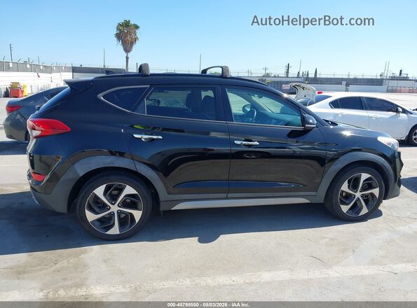 KM8J33A21HU317850 2017 HYUNDAI TUCSON Black Սալոնի հետևի տեսք