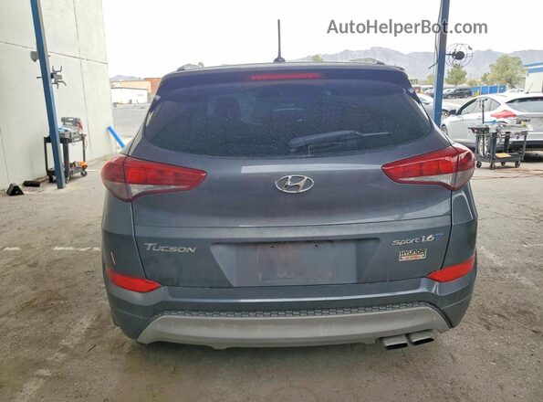 KM8J33A21HU525940 2017 HYUNDAI TUCSON Серый Вид сзади