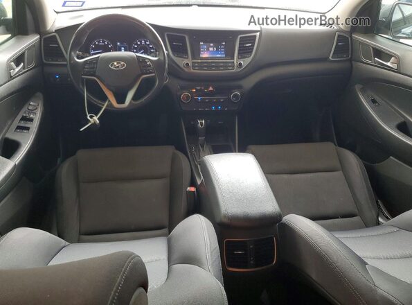 KM8J33A21HU525940 2017 HYUNDAI TUCSON Серый Вид панели приборов