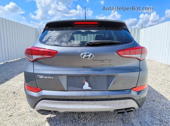 KM8J33A21HU559103 2017 HYUNDAI TUCSON Gray Vista trasera