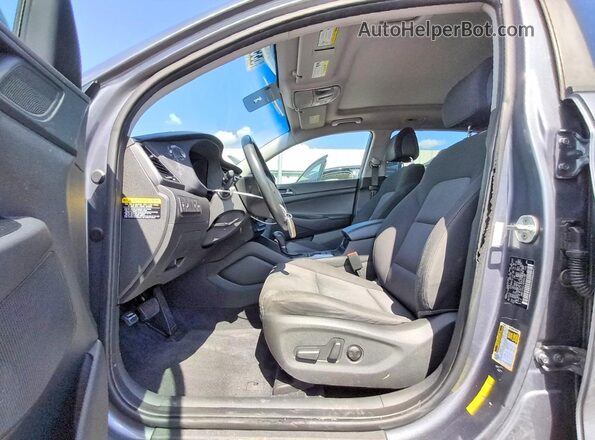 KM8J33A21HU559103 2017 HYUNDAI TUCSON Gray Vista interior delantera