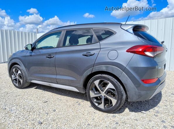 KM8J33A21HU559103 2017 HYUNDAI TUCSON Gray Trasero izquierdo