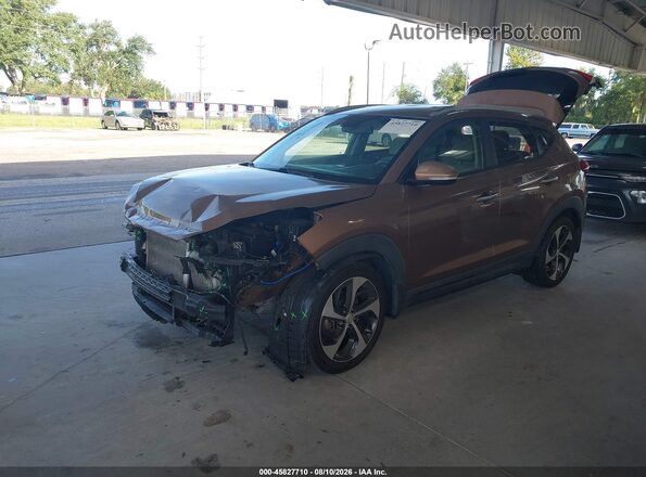 KM8J33A22GU191643 2016 HYUNDAI TUCSON Brown წინა მარცხენა ხედი სამი მეოთხედიდან