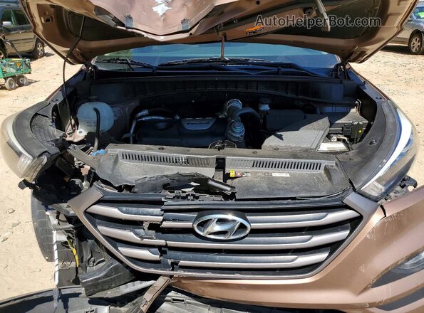 KM8J33A22GU251176 2016 HYUNDAI TUCSON Brown Vista del compartimento del motor