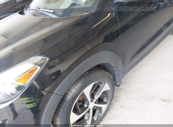 KM8J33A22GU267751 2016 HYUNDAI TUCSON Black Widok z przodu