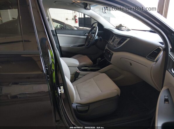 KM8J33A22GU267751 2016 HYUNDAI TUCSON Black Widok wnętrza z przodu