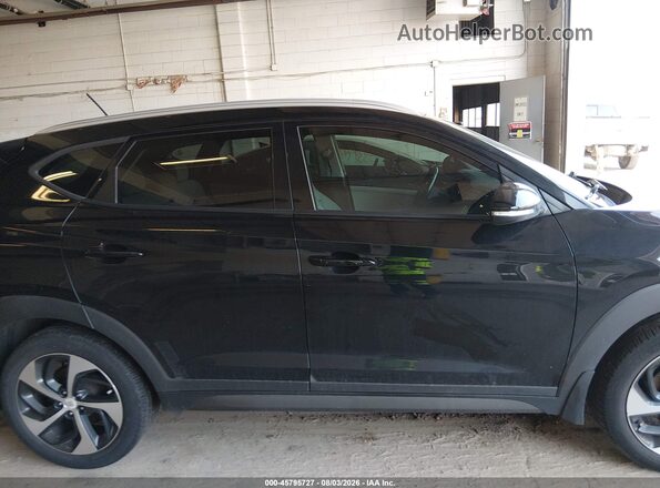 KM8J33A22GU267751 2016 HYUNDAI TUCSON Black Widok wnętrza z tyłu