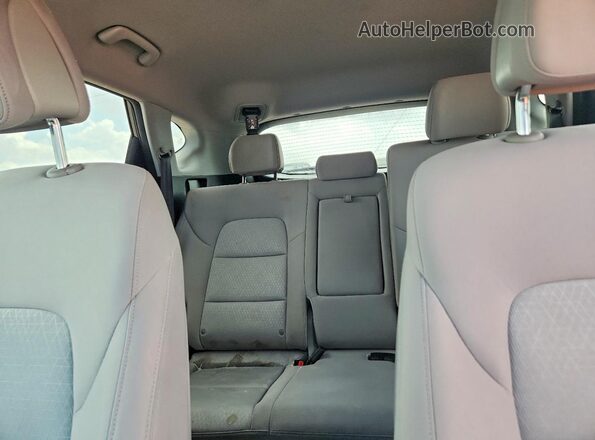 KM8J33A23GU194549 2016 HYUNDAI TUCSON Gray Vista interior trasera