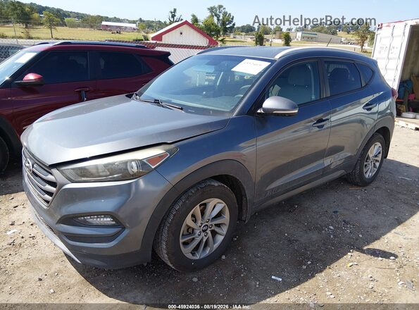 KM8J33A23GU211981 2016 HYUNDAI TUCSON Серый Передняя левая четверть