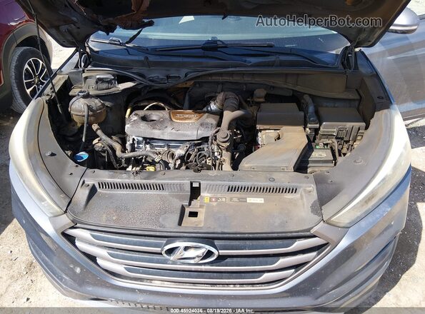 KM8J33A23GU211981 2016 HYUNDAI TUCSON Серый Вид сзади