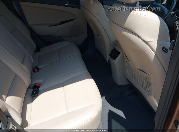 KM8J33A23GU220082 2016 HYUNDAI TUCSON Brown VIN sticker view