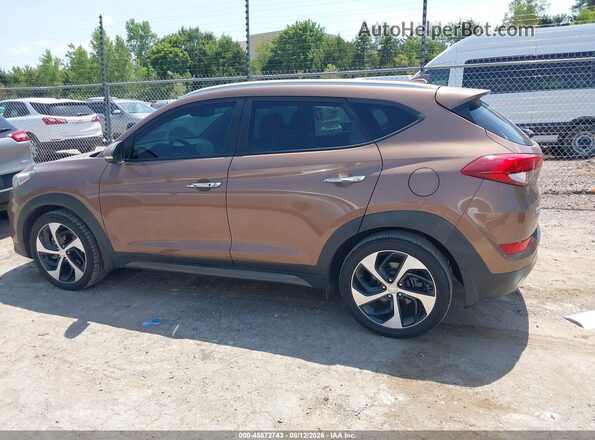 KM8J33A23GU220082 2016 HYUNDAI TUCSON Brown 360 interior view
