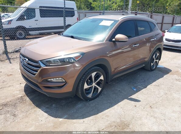 KM8J33A23GU220082 2016 HYUNDAI TUCSON Brown Front left
