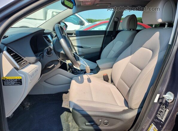 KM8J33A23JU637743 2018 HYUNDAI TUCSON Gray Front interior view