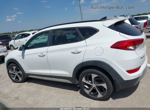 KM8J33A23JU773676 2018 HYUNDAI TUCSON White Rear interior view