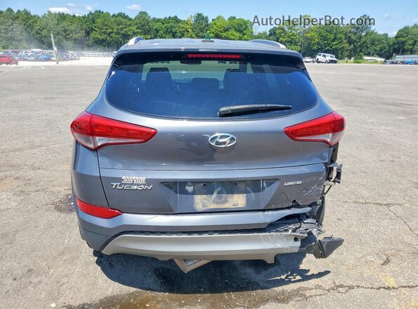 KM8J33A24GU059600 2016 HYUNDAI TUCSON Gray Widok z tyłu