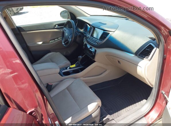 KM8J33A24GU077837 2016 HYUNDAI TUCSON Burgundy Front interior view