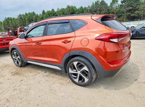 KM8J33A24HU560732 2017 HYUNDAI TUCSON Orange Trasero izquierdo