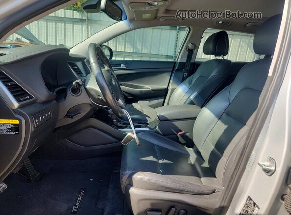 KM8J33A25GU265850 2016 HYUNDAI TUCSON Silver Widok wnętrza z przodu