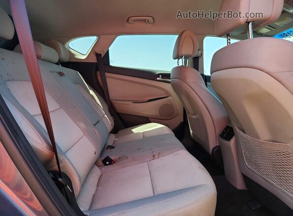 KM8J33A25HU577412 2017 HYUNDAI TUCSON Серый Вид задней части салона