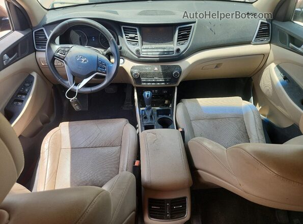 KM8J33A26GU071389 2016 HYUNDAI TUCSON Коричневый Вид панели приборов