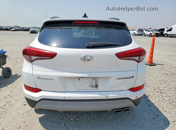 KM8J33A26JU763787 2018 HYUNDAI TUCSON White Հետևի տեսք