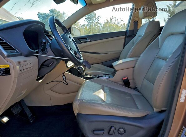 KM8J33A27GU235684 2016 HYUNDAI TUCSON Brown Սալոնի դիմացի տեսք