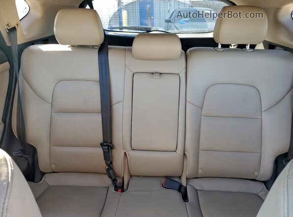 KM8J33A27GU235684 2016 HYUNDAI TUCSON Brown Հետևի նստատեղերի տեսք