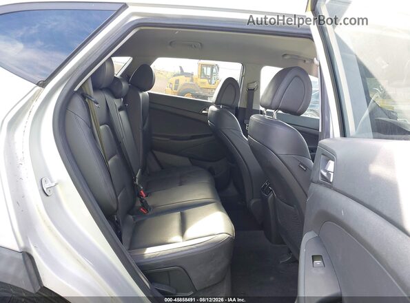 KM8J33A28GU038667 2016 HYUNDAI TUCSON Silver VIN sticker view